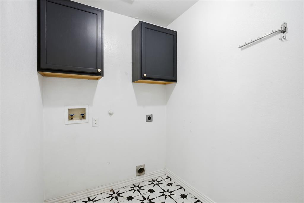 5201 Geode Lane McKinney, TX 75072 - Photo 30 of 37 Full size laundry room with built in cabin