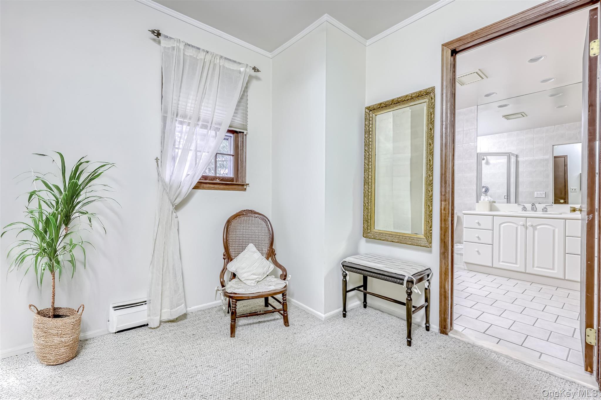 16 Kings Gate Road Suffern, NY 10901 - Photo 13 of 21 a living room with furniture and a potted plant