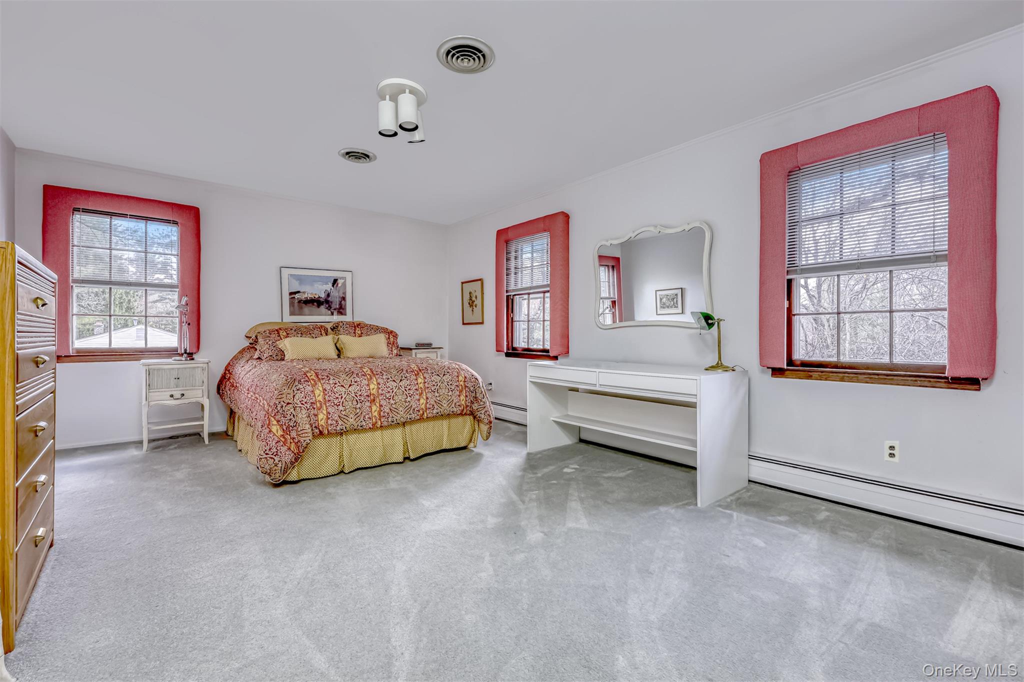 16 Kings Gate Road Suffern, NY 10901 - Photo 15 of 21 a bedroom with a bed and window