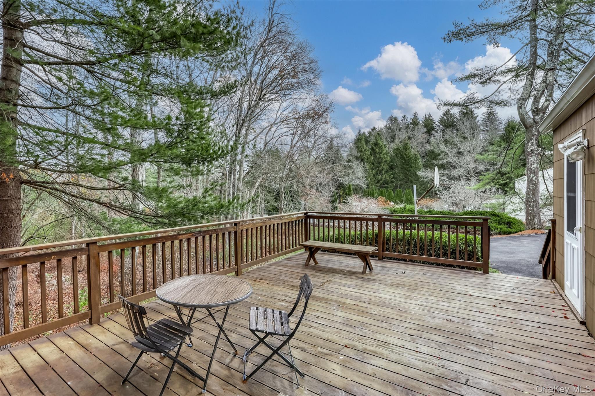 16 Kings Gate Road Suffern, NY 10901 - Photo 19 of 21 a view of balcony with wooden floor and outdoor seating