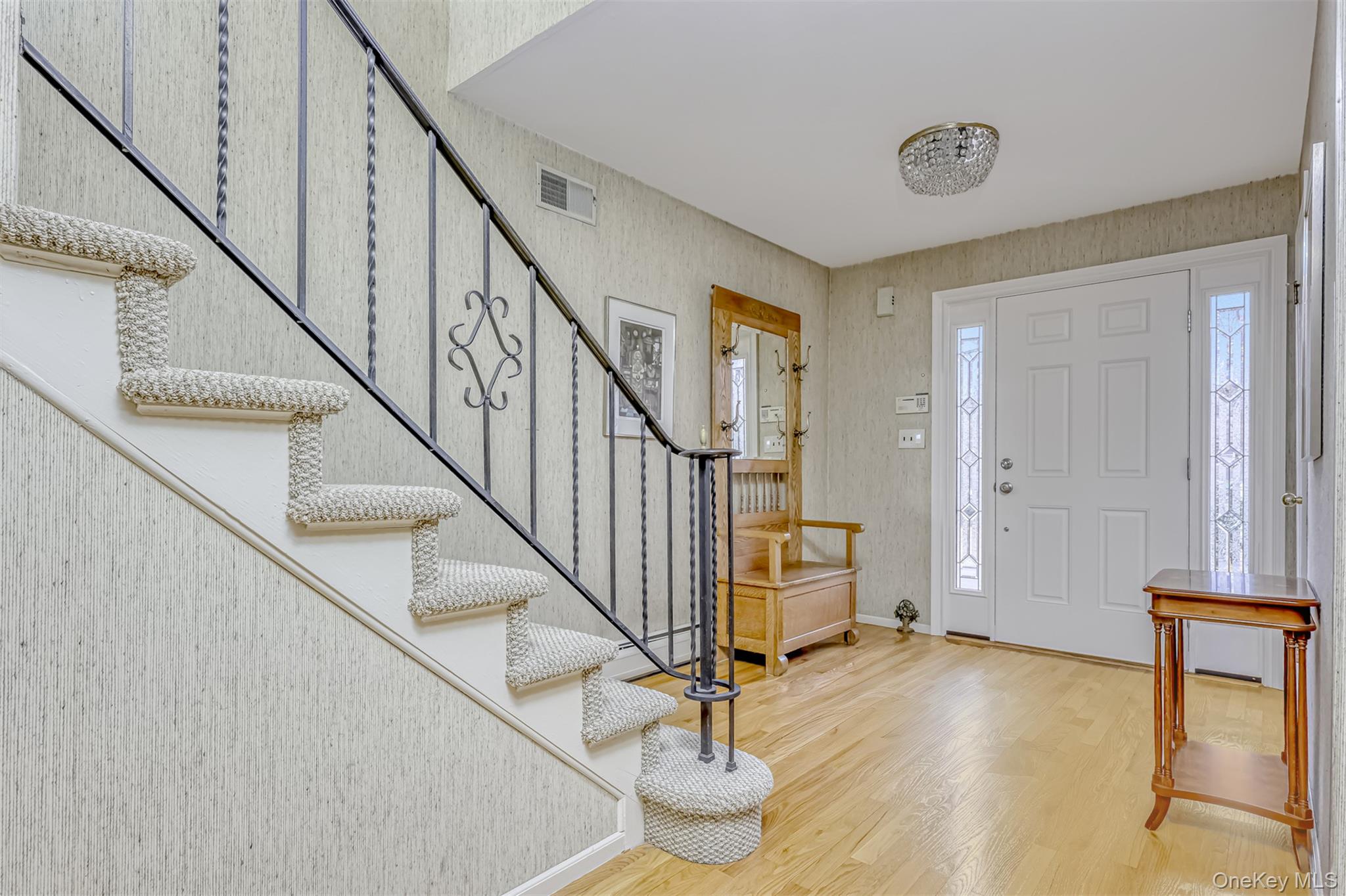 16 Kings Gate Road Suffern, NY 10901 - Photo 4 of 21 a view of entryway with wooden floor and stairs