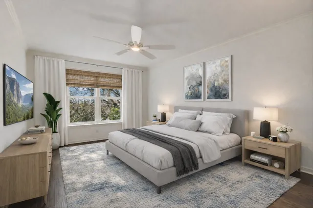 a bathroom with a sink a toilet and a window