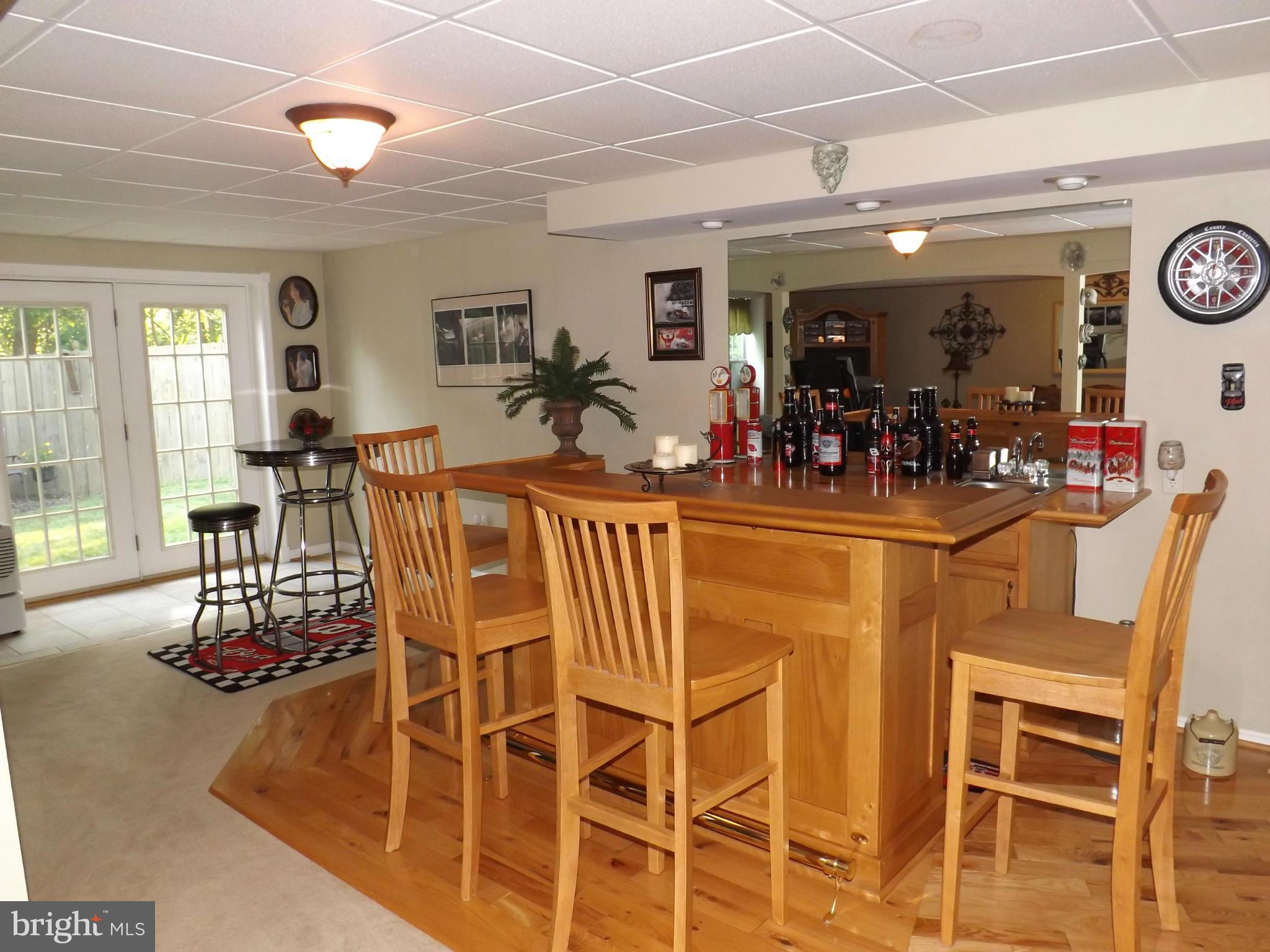 36 Roger Court Ranson, WV 25438 - Photo 5 of 29 a view of a dining room with furniture and chandelier