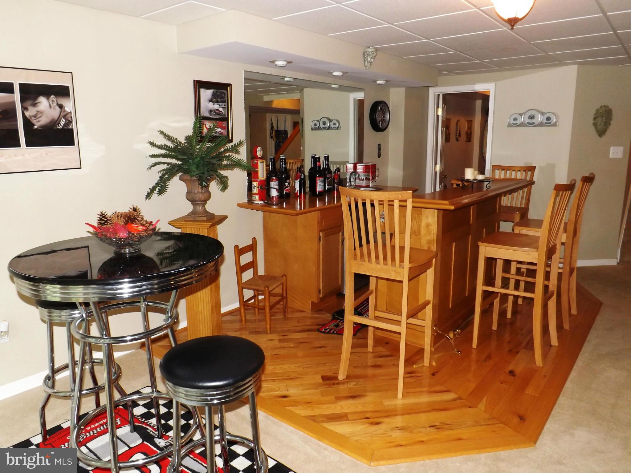 36 Roger Court Ranson, WV 25438 - Photo 7 of 29 a view of a dining room with furniture and chandelier