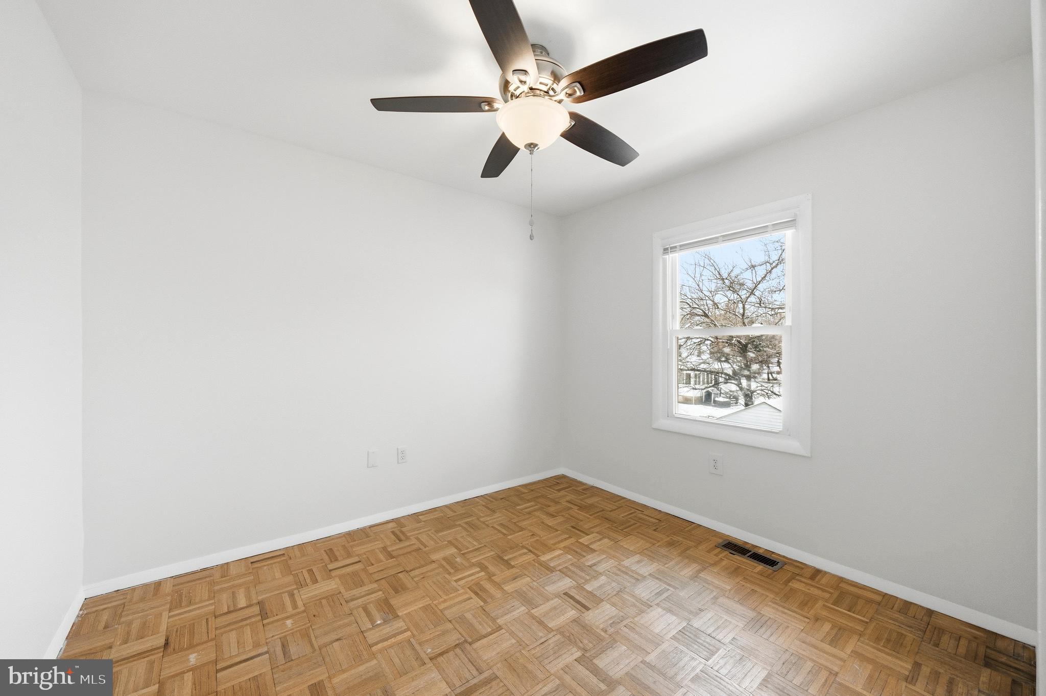 652 Chapelview Drive Odenton, MD 21113 - Photo 28 of 50 an empty room with a window and a fan