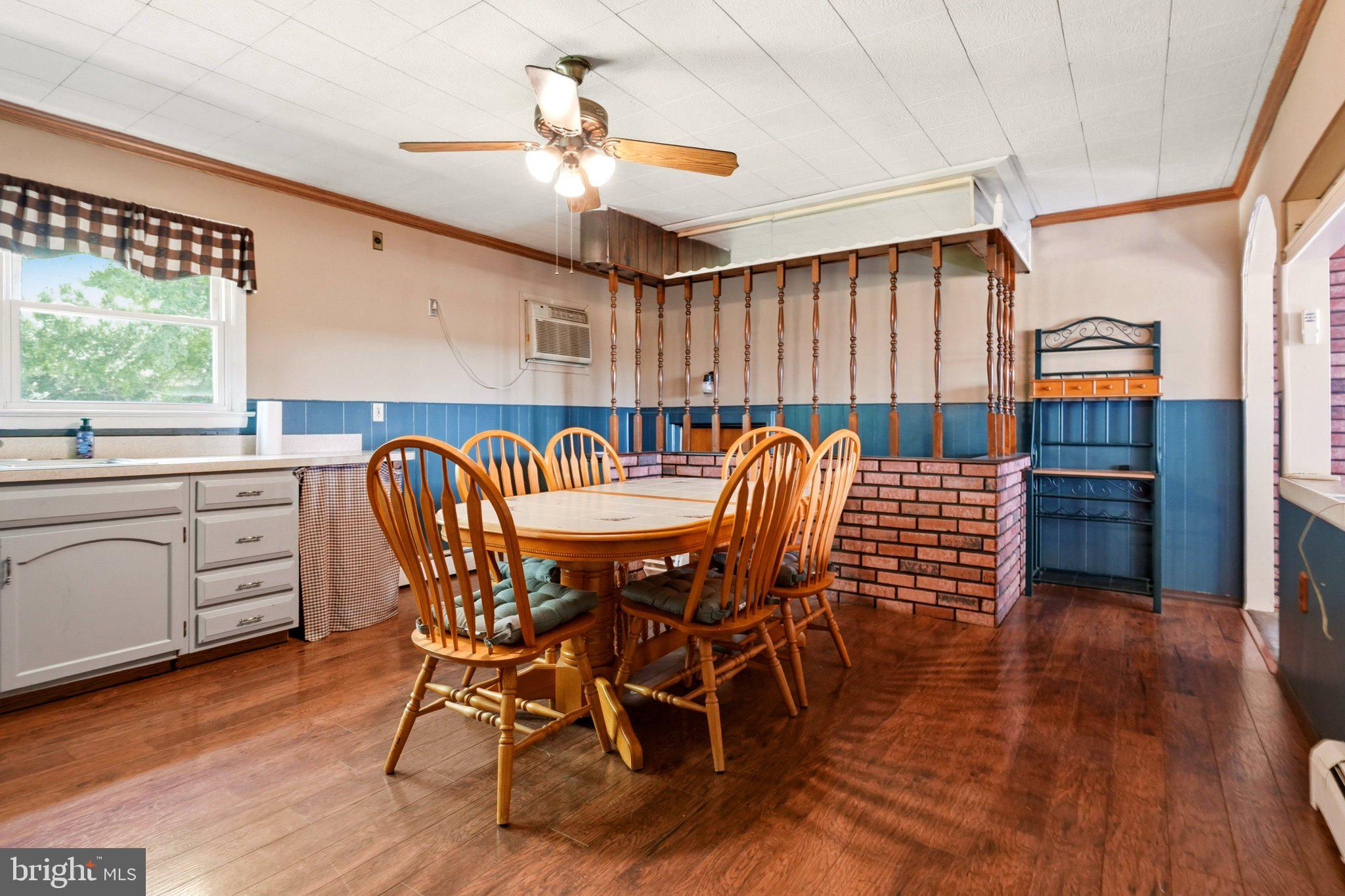 19 South Tilbury Road Salem, NJ 08079 - Photo 15 of 25 Charming dining area with rustic flair.