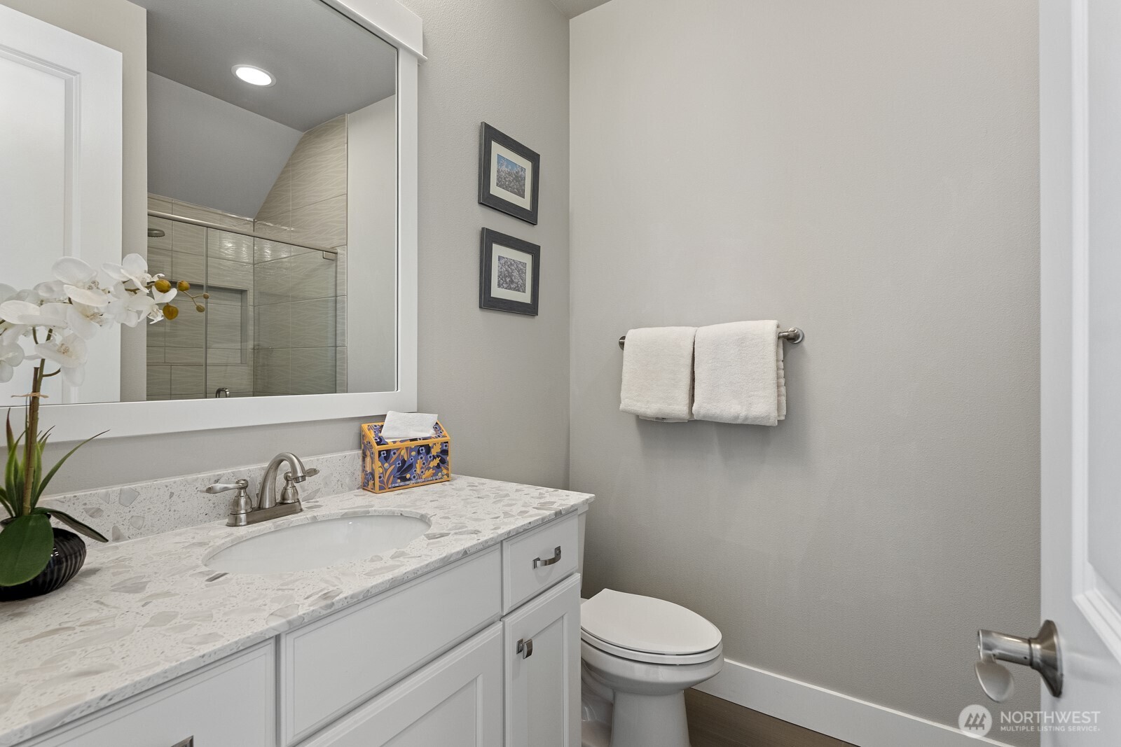 22752 Southeast 265th Place Maple Valley, WA 98038 - Photo 13 of 39 a bathroom with a granite countertop sink and a mirror