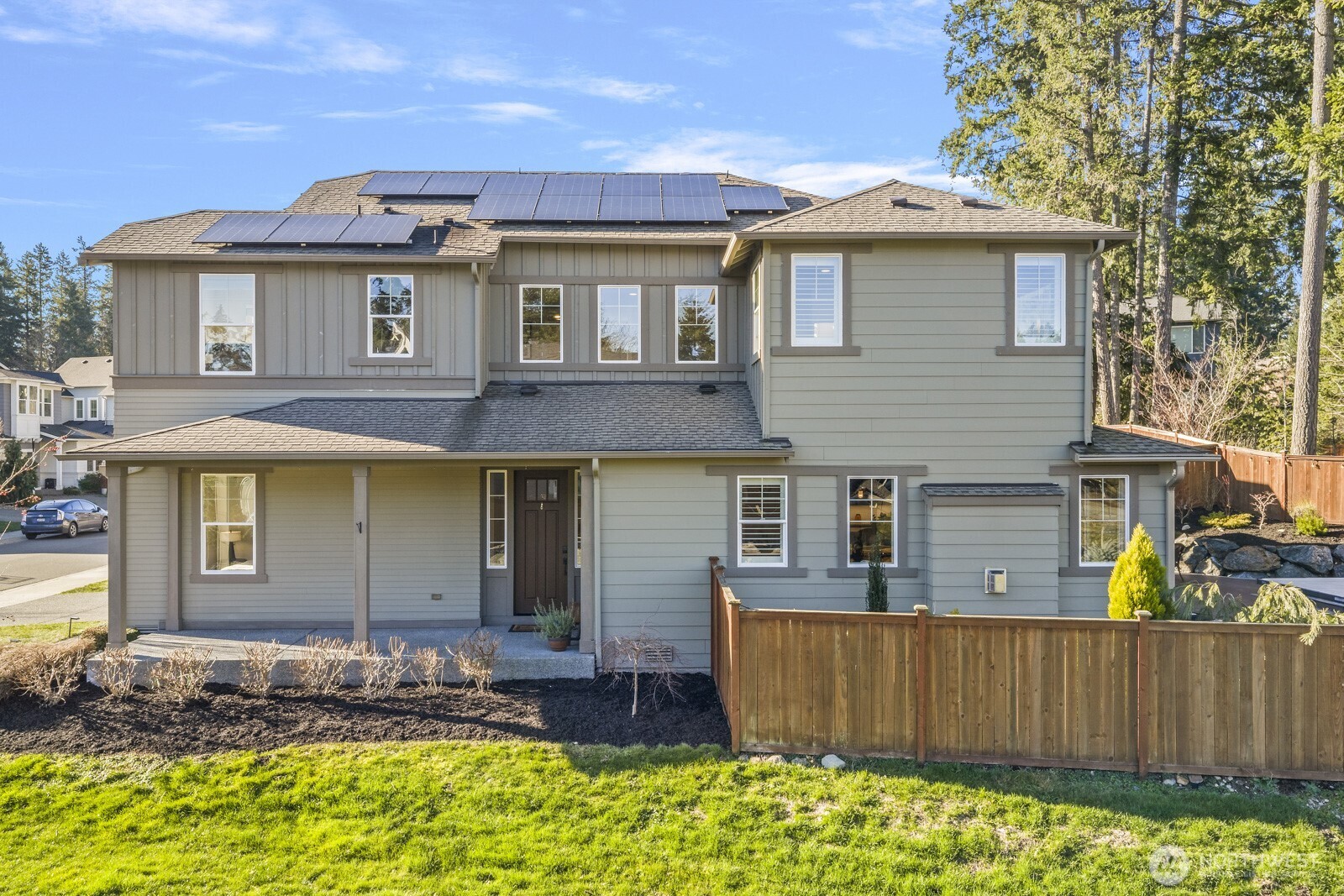 22752 Southeast 265th Place Maple Valley, WA 98038 - Photo 28 of 39 a view of a house with wooden fence