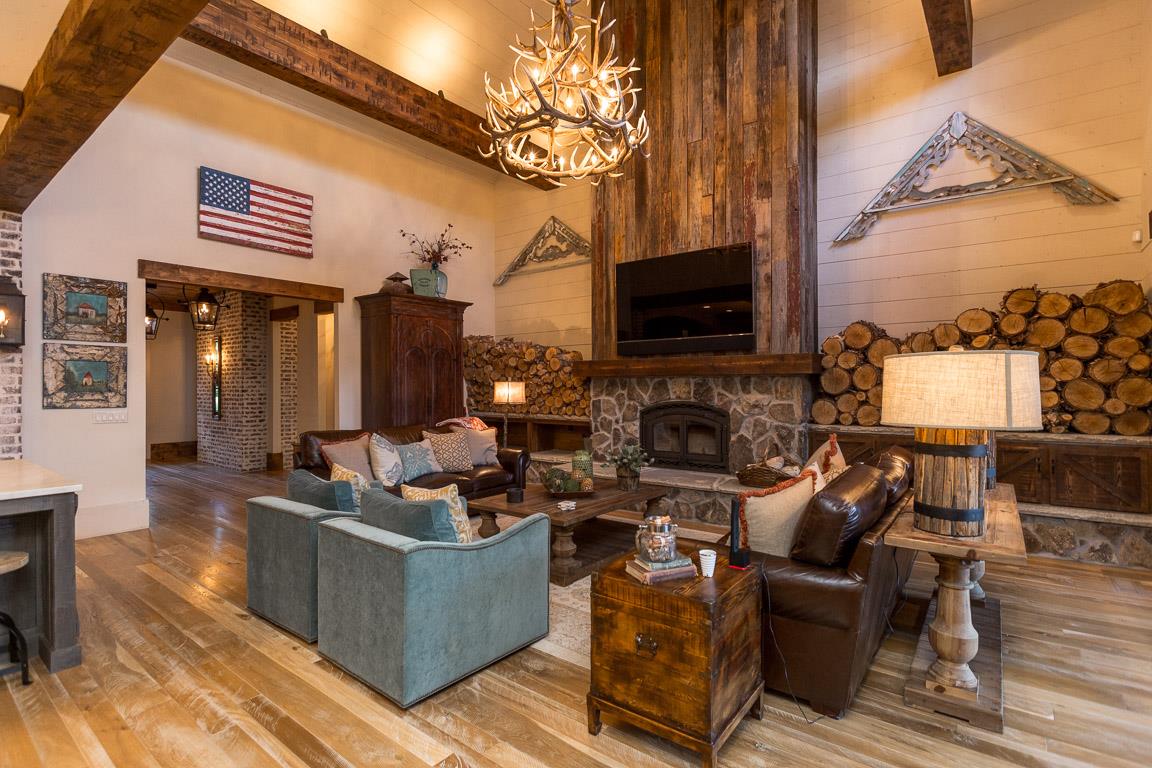 222 Poydras Street Franklin, TN 37069 - Photo 12 of 30 a living room with furniture a flat screen tv and a fireplace