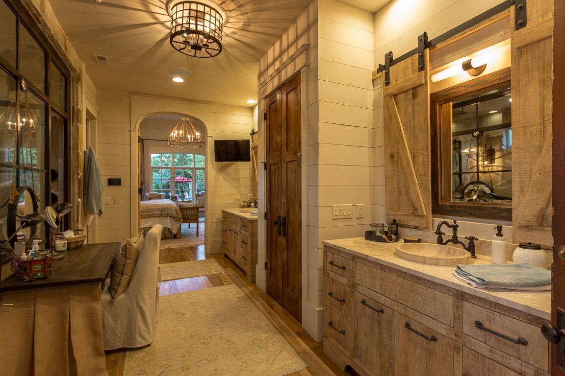 222 Poydras Street Franklin, TN 37069 - Photo 18 of 30 a bathroom with a sink double vanity and a mirror
