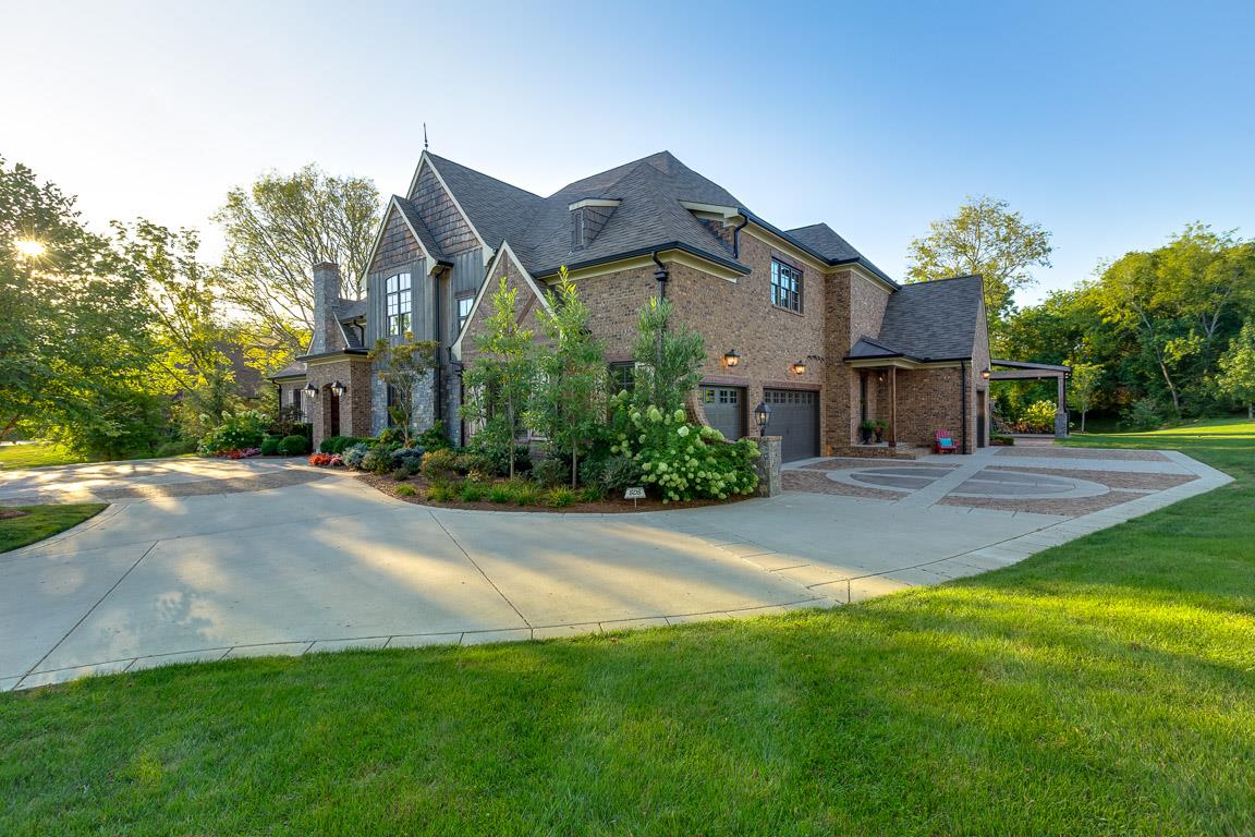 222 Poydras Street Franklin, TN 37069 - Photo 5 of 30 a front view of a house with a yard