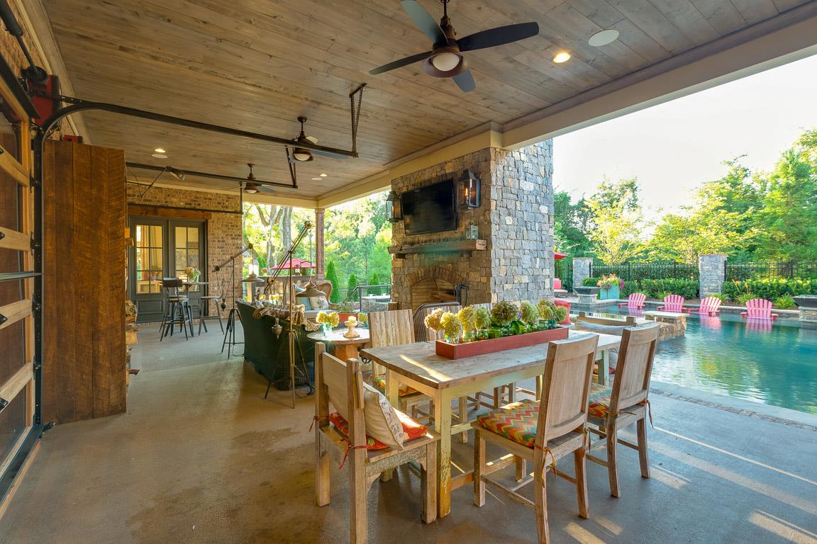 222 Poydras Street Franklin, TN 37069 - Photo 6 of 30 a view of an outdoor dining space with furniture and garden view