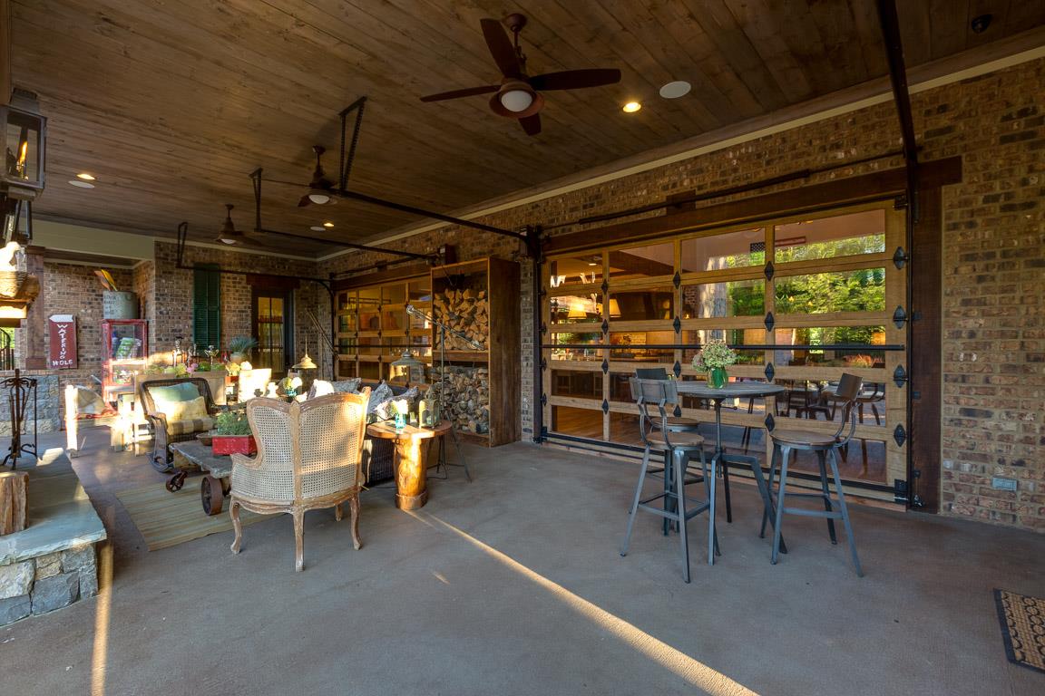 222 Poydras Street Franklin, TN 37069 - Photo 7 of 30 a view of a porch with chairs and a patio