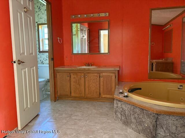 37 Willow Brook Farm Road Athens, NY 12414 - Photo 15 of 26 a bathroom with a tub sink and mirror