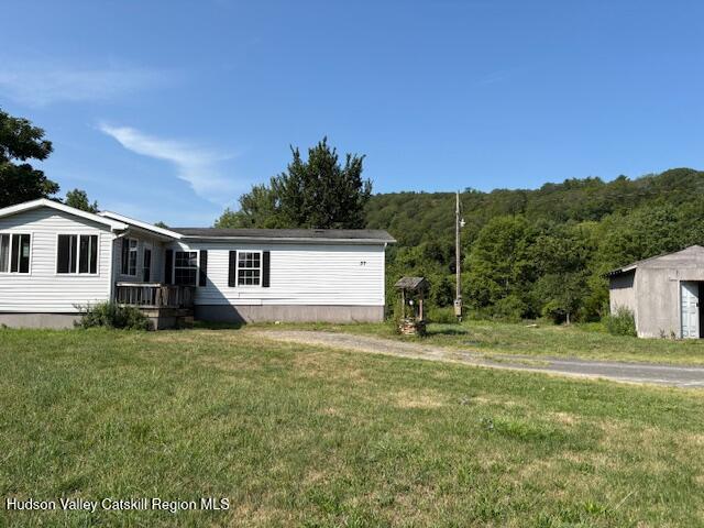 37 Willow Brook Farm Road Athens, NY 12414 - Photo 2 of 26 a view of a house with a yard