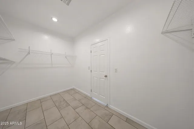 a view of a room with racks on the wall