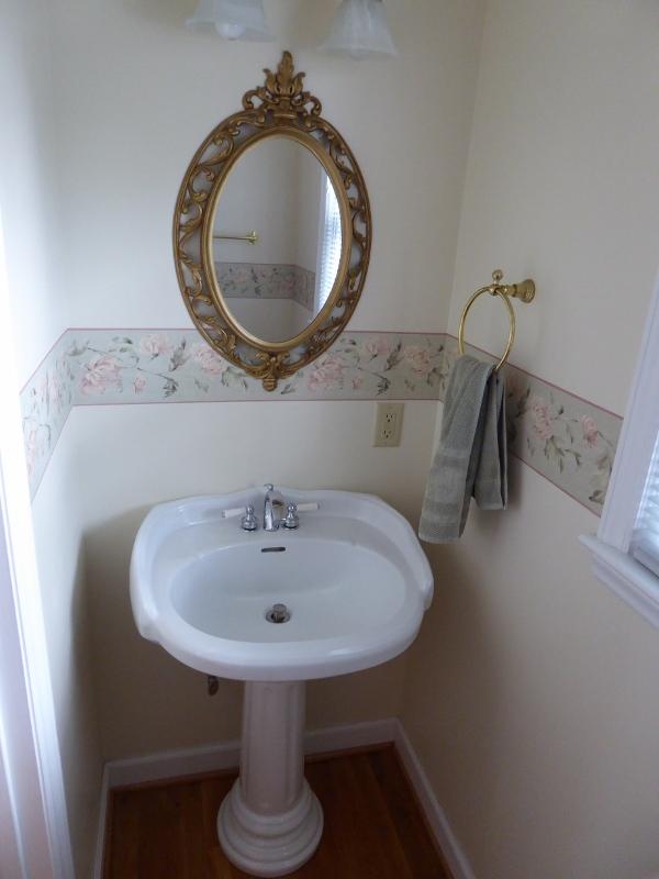 2115 Coles Knob Road Northeast Check, VA 24072 - Photo 14 of 36 a bathroom with a sink and a mirror