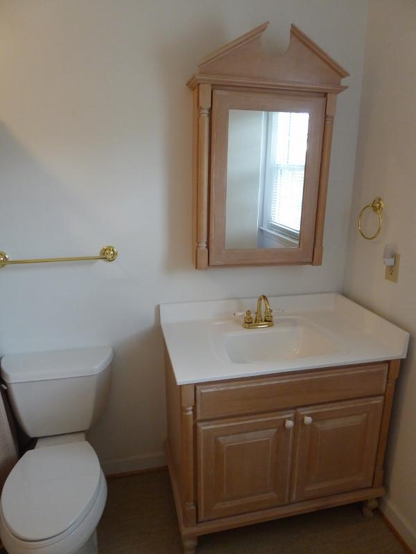 2115 Coles Knob Road Northeast Check, VA 24072 - Photo 22 of 36 a bathroom with a toilet sink and mirror