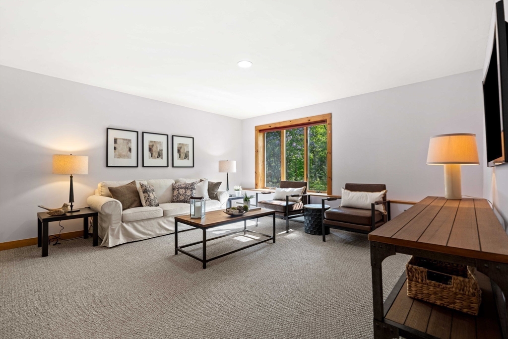 3 Whitman Place Beverly, MA 01915 - Photo 18 of 34 a living room with furniture and a lamp