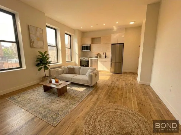 a living room with furniture and a couch