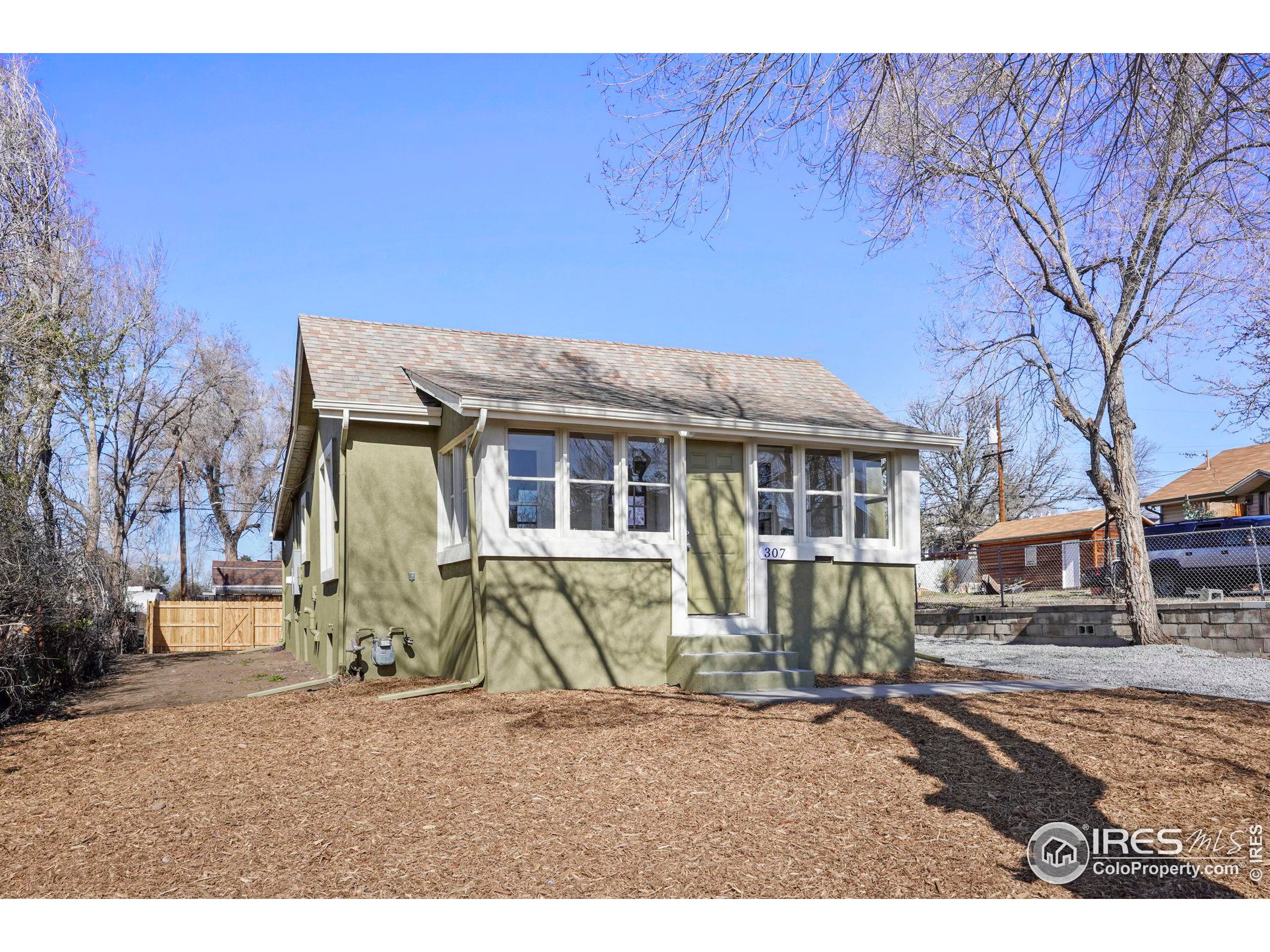 307 Meade Street Denver, CO 80219 - Photo 1 of 1 a view of a house with a patio