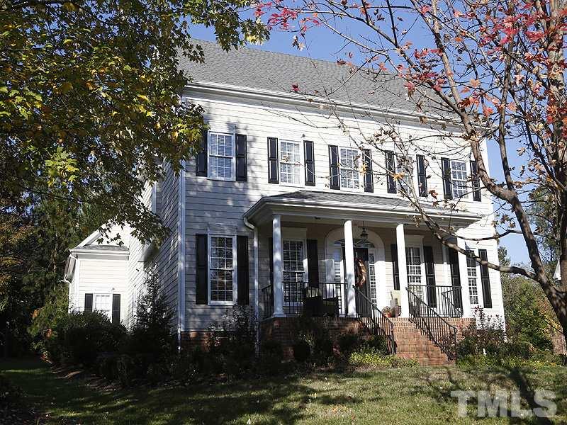 3209 Tall Tree Place Raleigh, NC 27607 - Photo 22 of 22 a front view of a house
