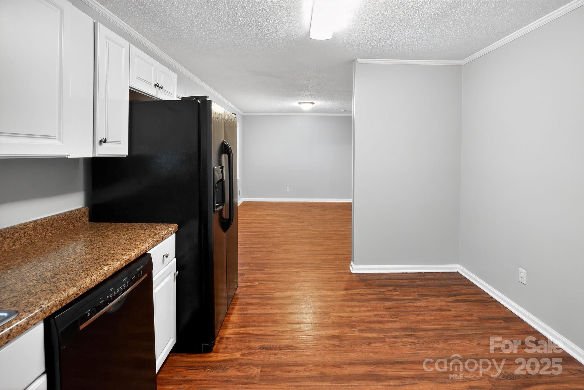 3725 Harrogate Road Columbia, SC 29210 - Photo 14 of 31 a kitchen with granite countertop a refrigerator and a stove