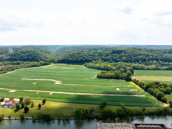 a view of a golf course with a lake