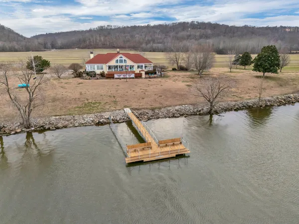 a living room with furniture or couch and a fireplace