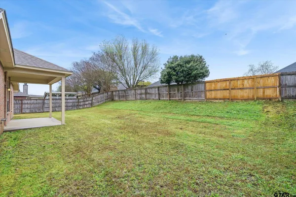a view of a backyard with a garden