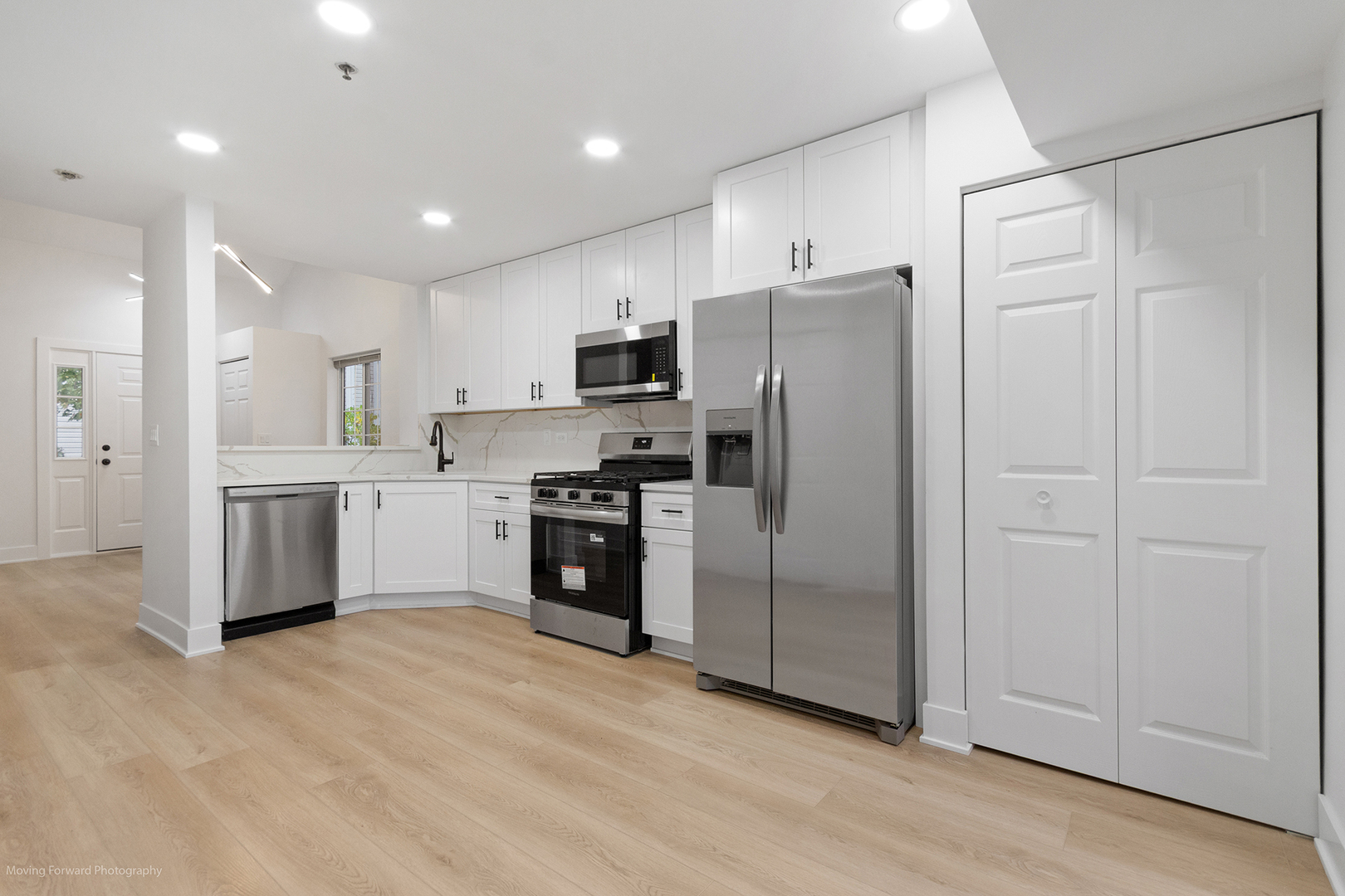 372 Windsong Court Bolingbrook, IL 60440 - Photo 15 of 29 a kitchen with stainless steel appliances a refrigerator and a sink