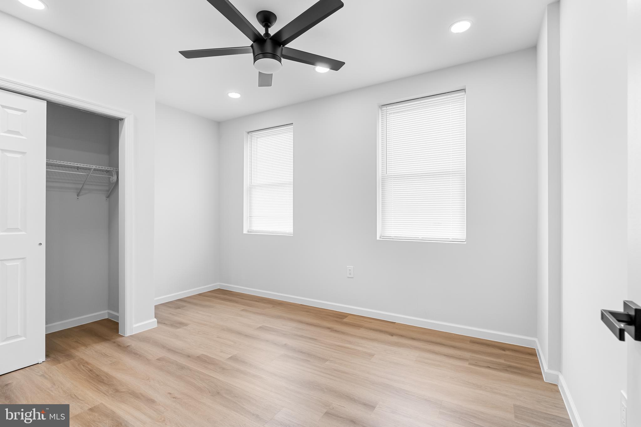 1242 North 15th Street, Unit 2 Philadelphia, PA 19121 - Photo 13 of 19 wooden floor in an empty room with a window
