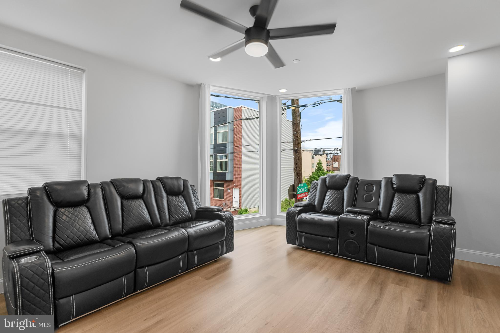 1242 North 15th Street, Unit 2 Philadelphia, PA 19121 - Photo 8 of 19 a living room with furniture and a large window