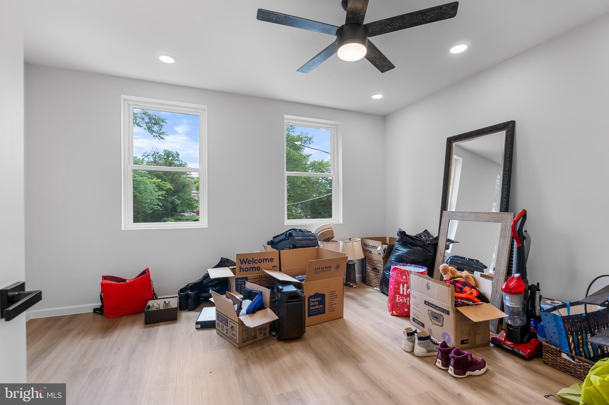 1242 North 15th Street, Unit 2 Philadelphia, PA 19121 - Photo 10 of 19 a living room with furniture and a window