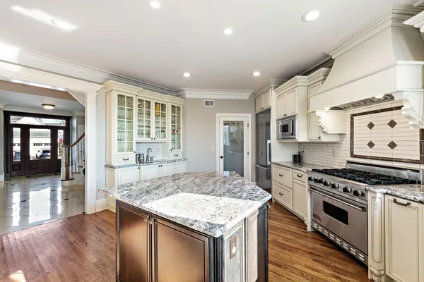 a bathroom with a sink a vanity and a mirror