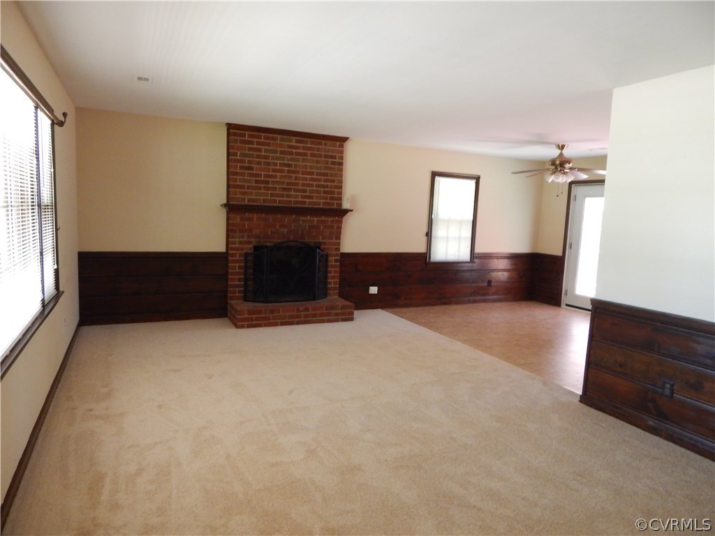 4813 Rollingway Road Chesterfield, VA 23832 - Photo 3 of 13 a view of empty room with wooden floor and fan