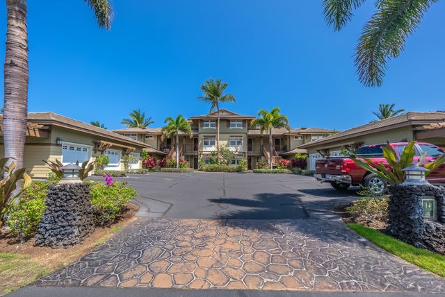 a view of a entryway with flower pots