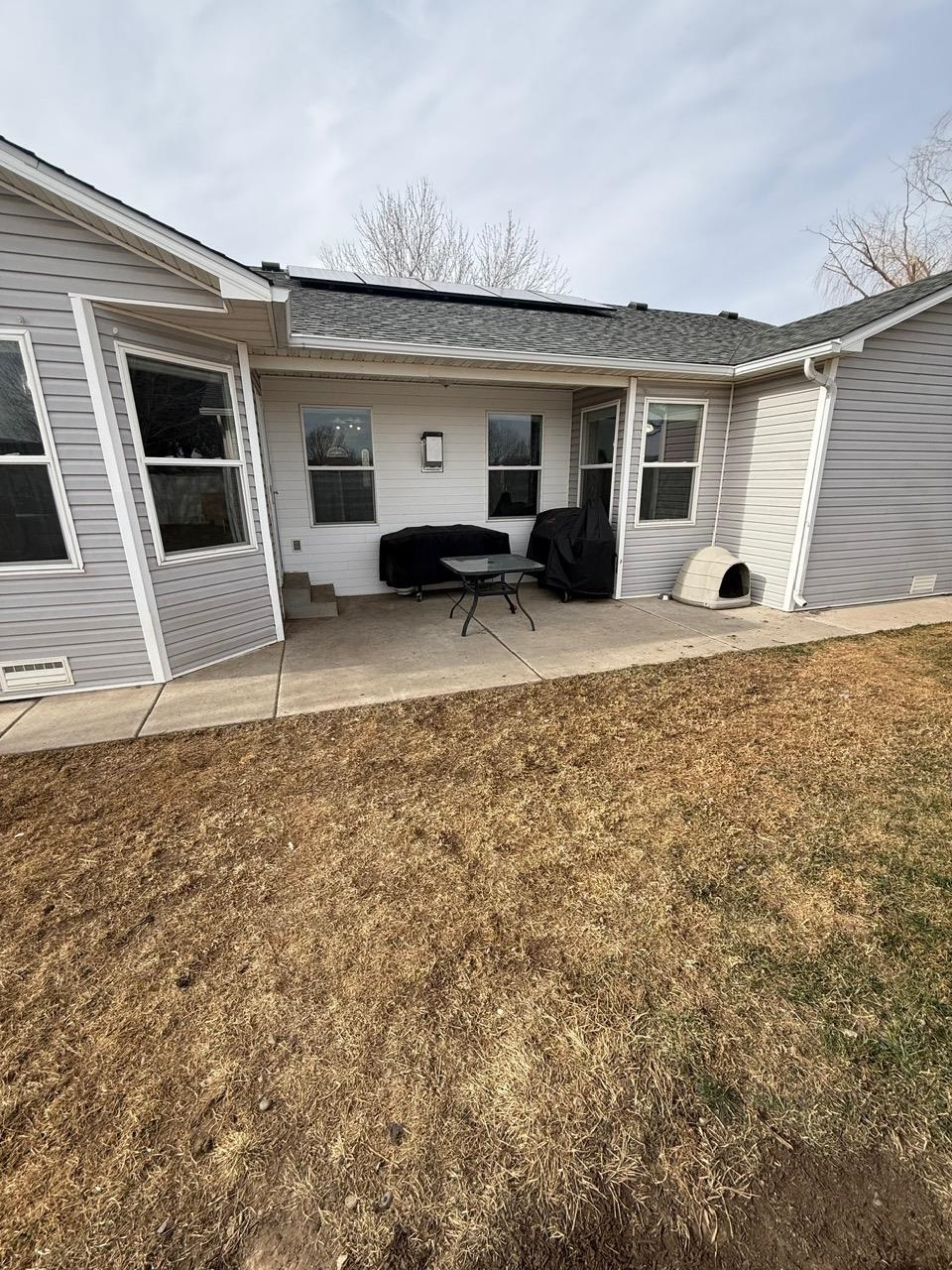 746 Granite Drive Fruita, CO 81521 - Photo 18 of 19 a house view with a backyard space
