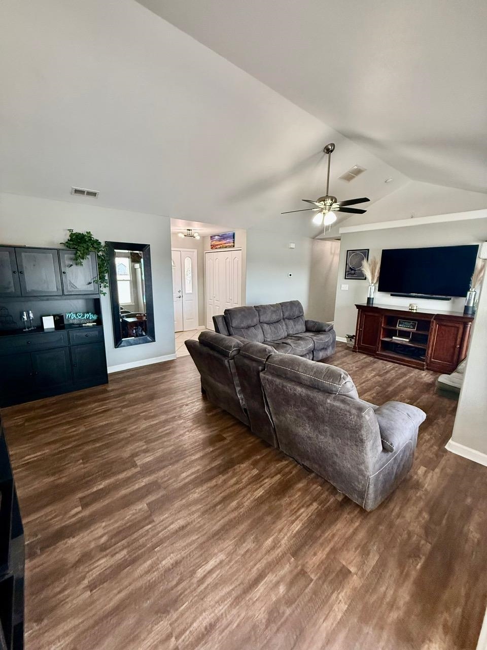746 Granite Drive Fruita, CO 81521 - Photo 4 of 19 a living room with furniture and a flat screen tv