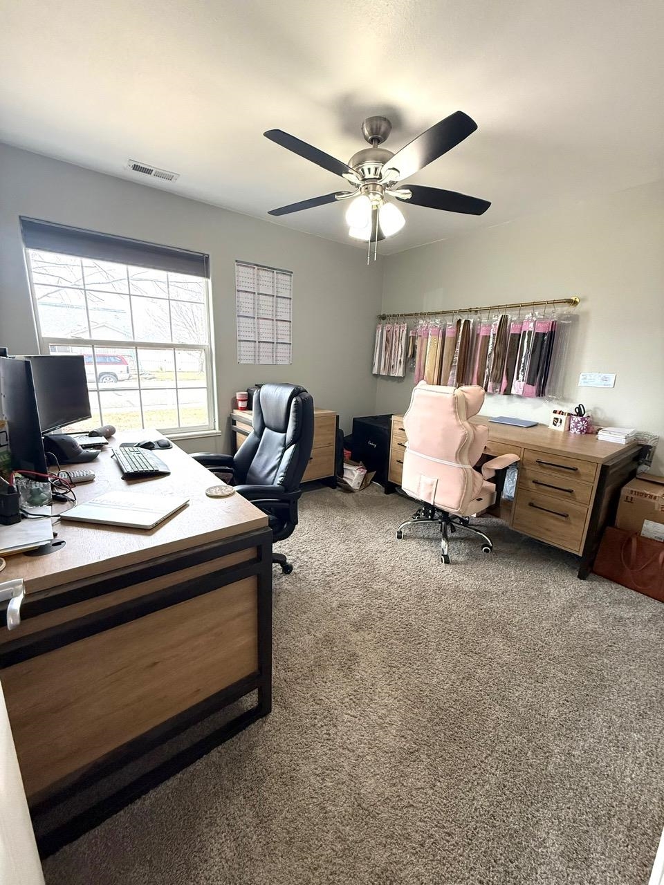 746 Granite Drive Fruita, CO 81521 - Photo 9 of 19 a living room with furniture ceiling fan and a window