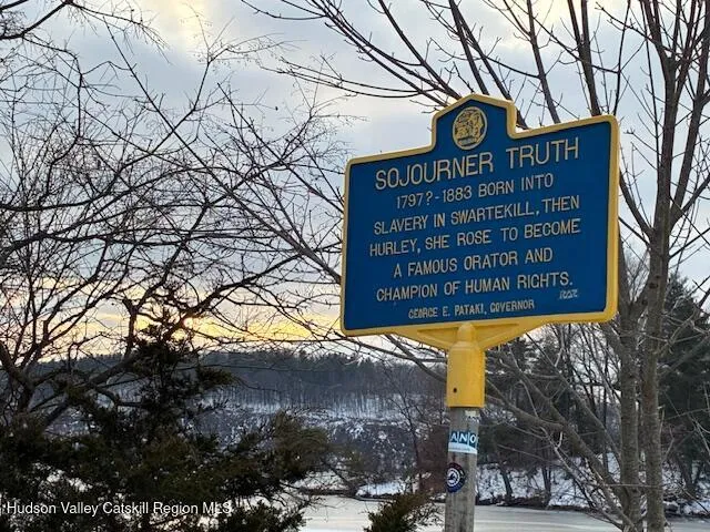 a sign on the side of a building