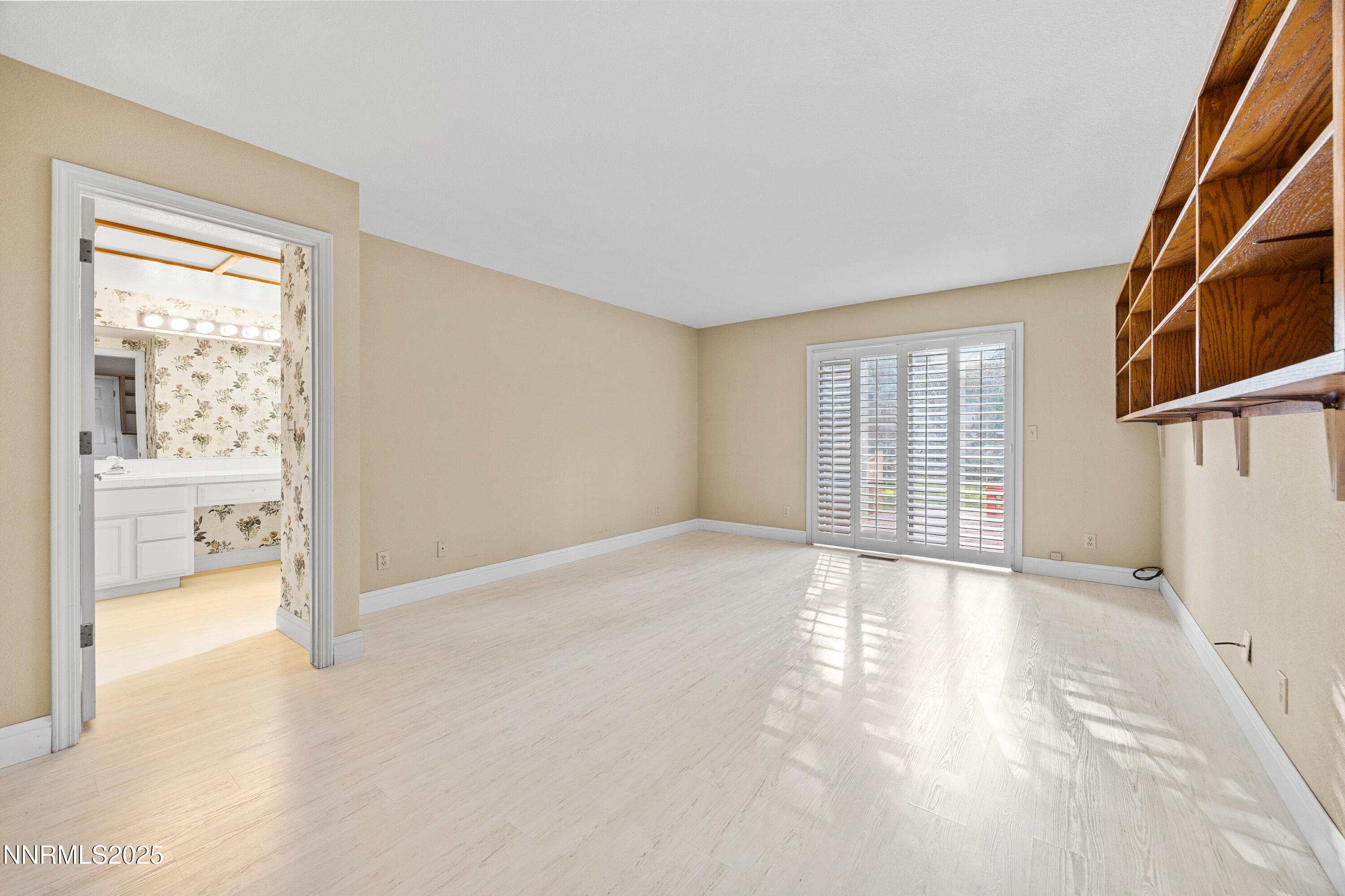6299 Stone Valley Drive Reno, NV 89523 - Photo 14 of 70 a view of an empty room with a window