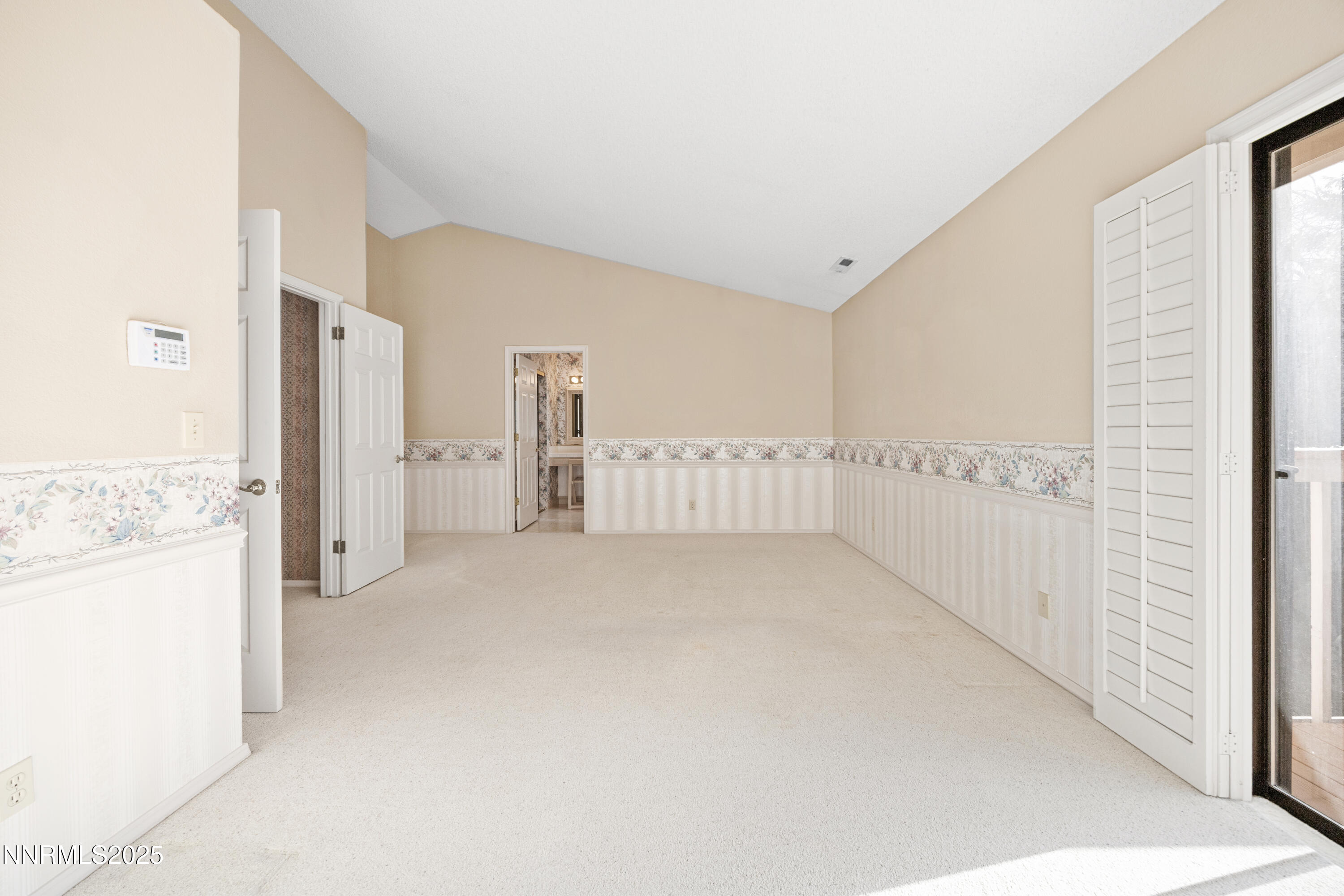 6299 Stone Valley Drive Reno, NV 89523 - Photo 38 of 70 a view of a big room with closet and windows