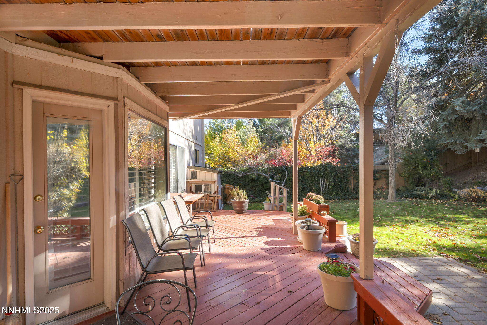 6299 Stone Valley Drive Reno, NV 89523 - Photo 44 of 70 a outdoor space with furniture and garden view