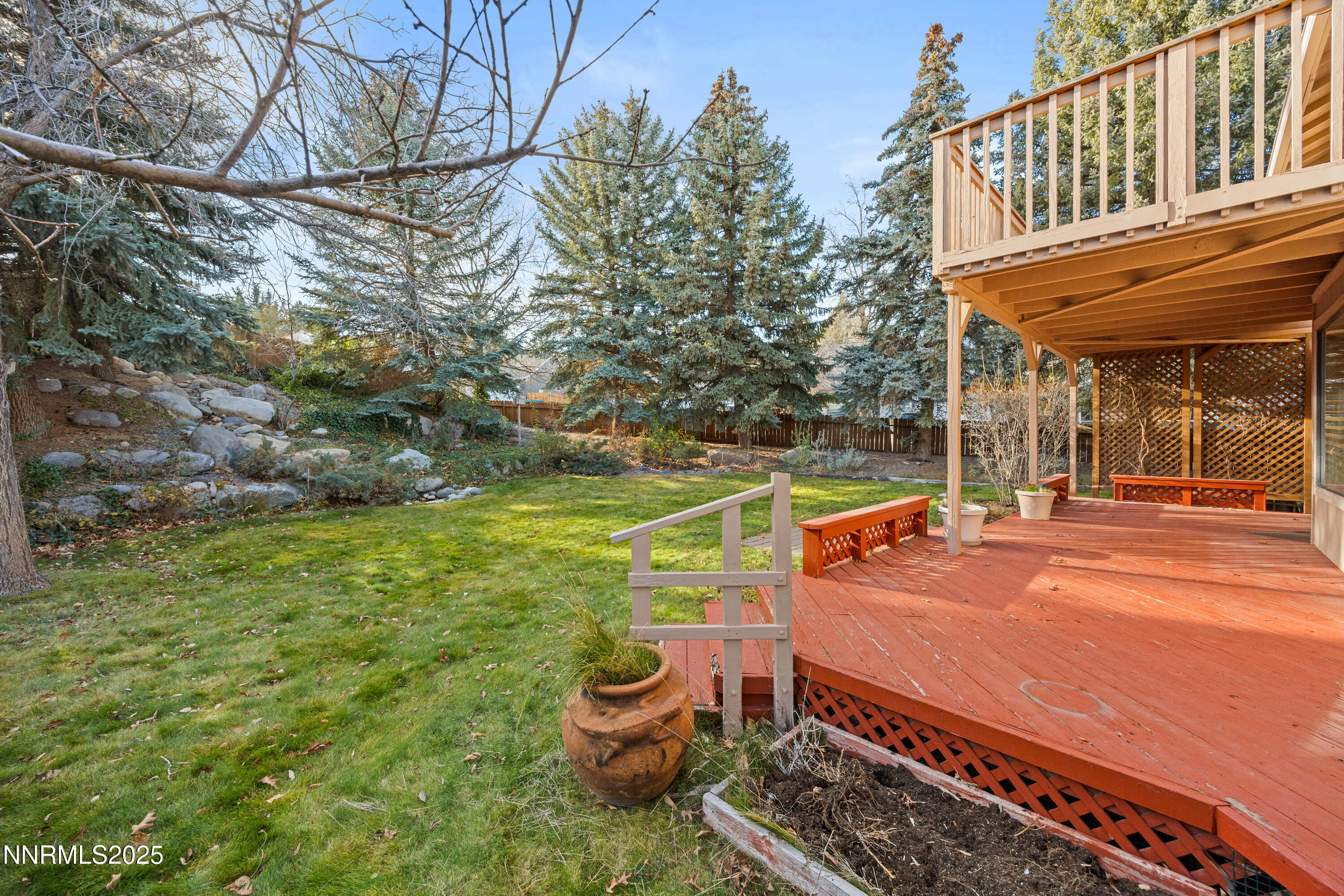 6299 Stone Valley Drive Reno, NV 89523 - Photo 45 of 70 a backyard of a house with barbeque oven table and chairs