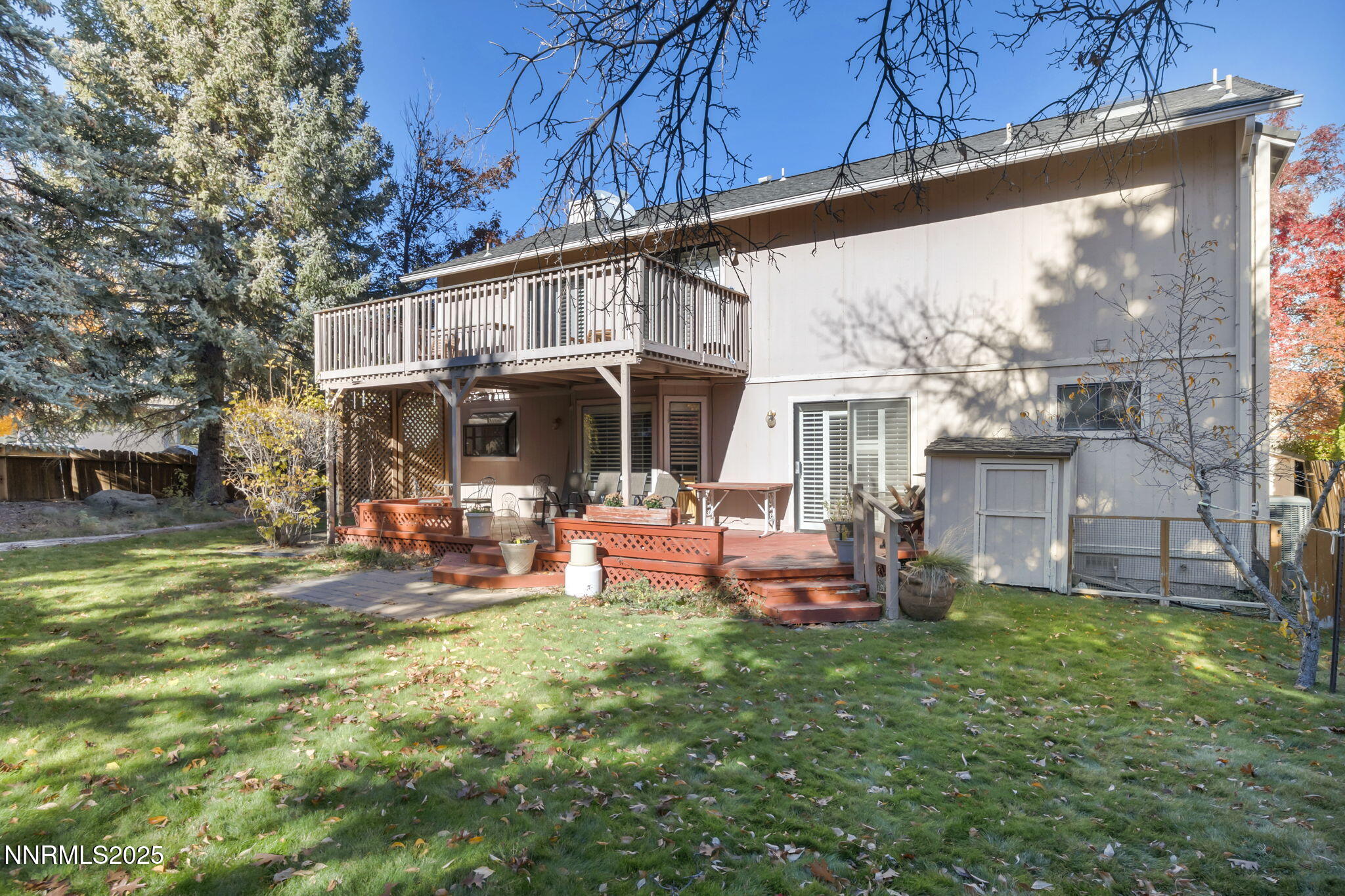 6299 Stone Valley Drive Reno, NV 89523 - Photo 48 of 70 a view of a house with backyard porch and sitting area