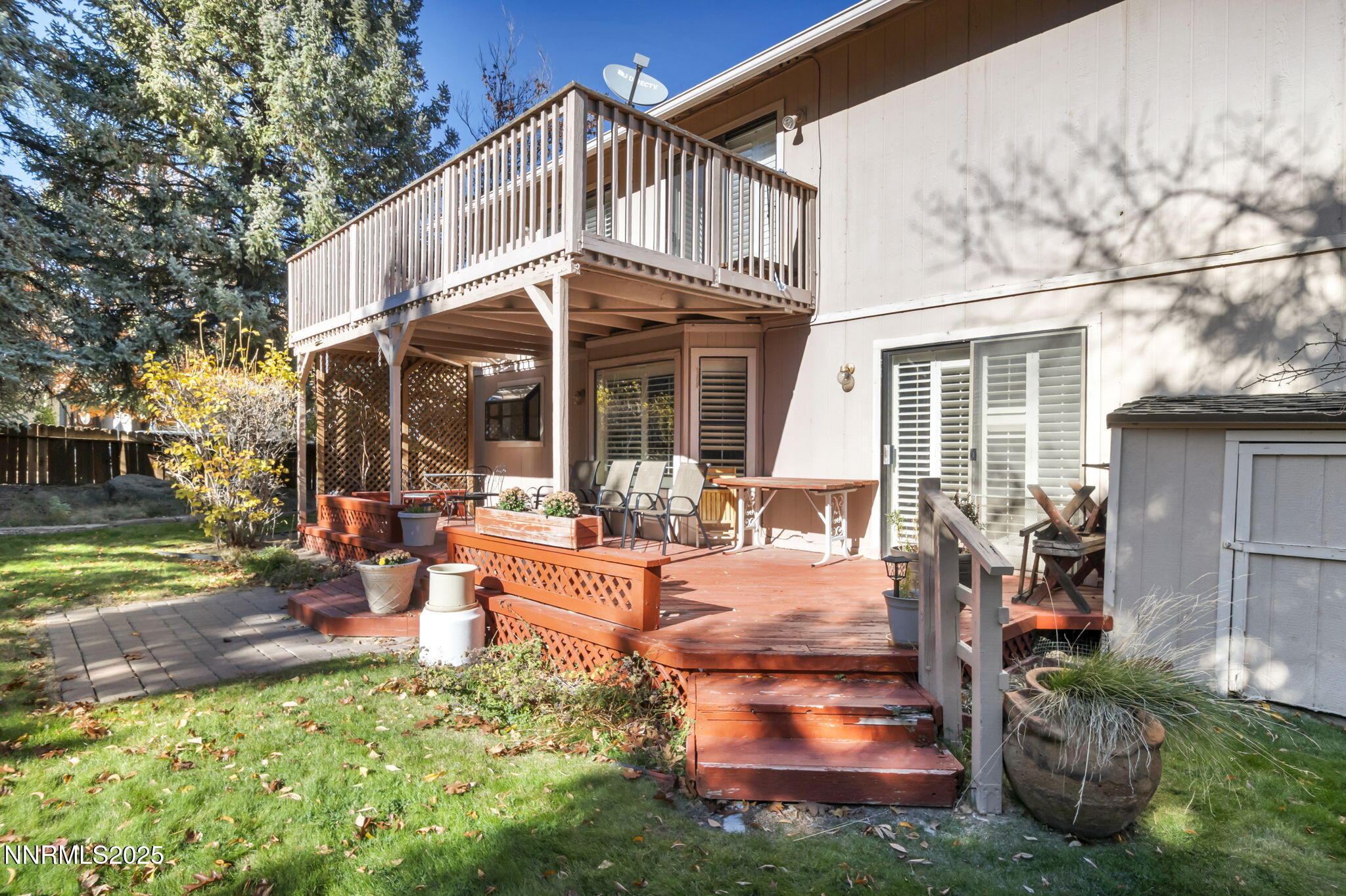 6299 Stone Valley Drive Reno, NV 89523 - Photo 49 of 70 a view of a house with backyard porch and sitting area