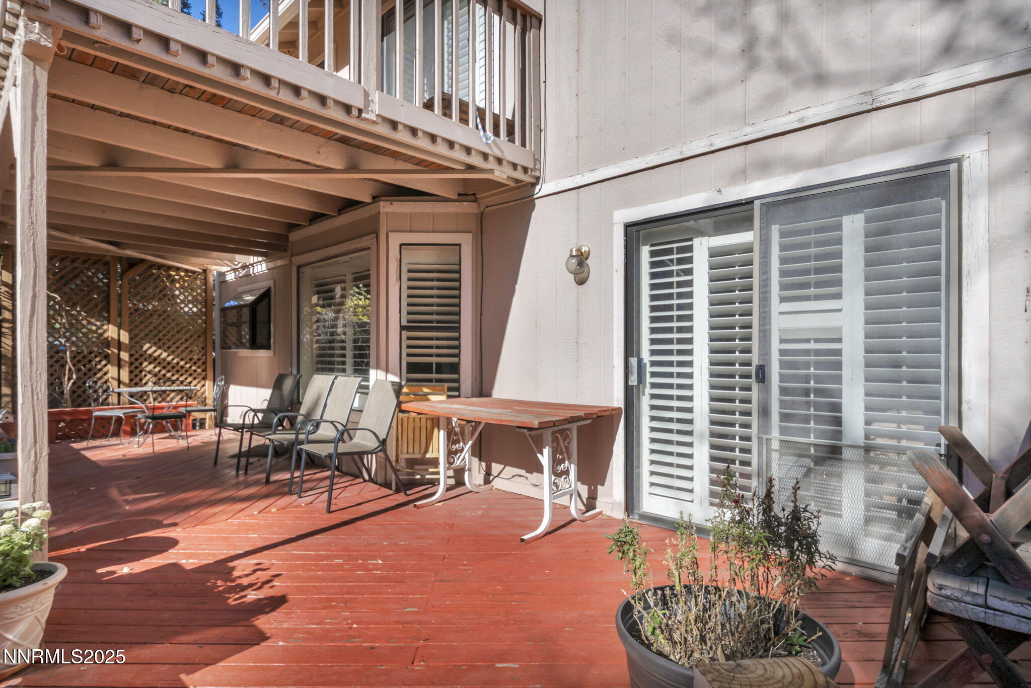 6299 Stone Valley Drive Reno, NV 89523 - Photo 51 of 70 a building outdoor space with patio furniture and potted plants