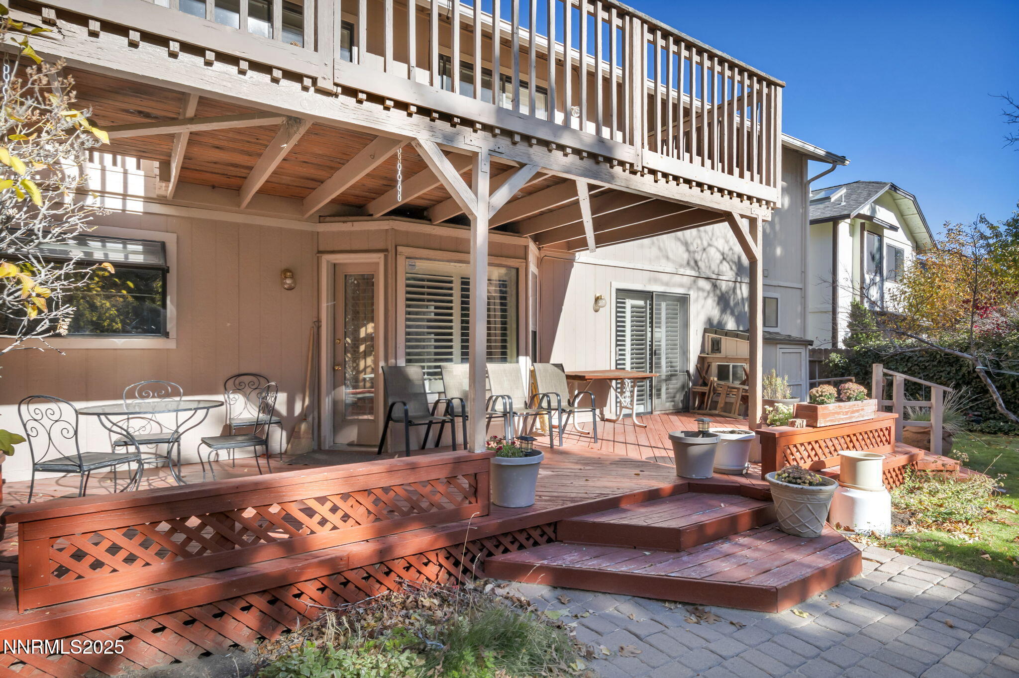 6299 Stone Valley Drive Reno, NV 89523 - Photo 52 of 70 a view of a house with backyard porch and sitting area