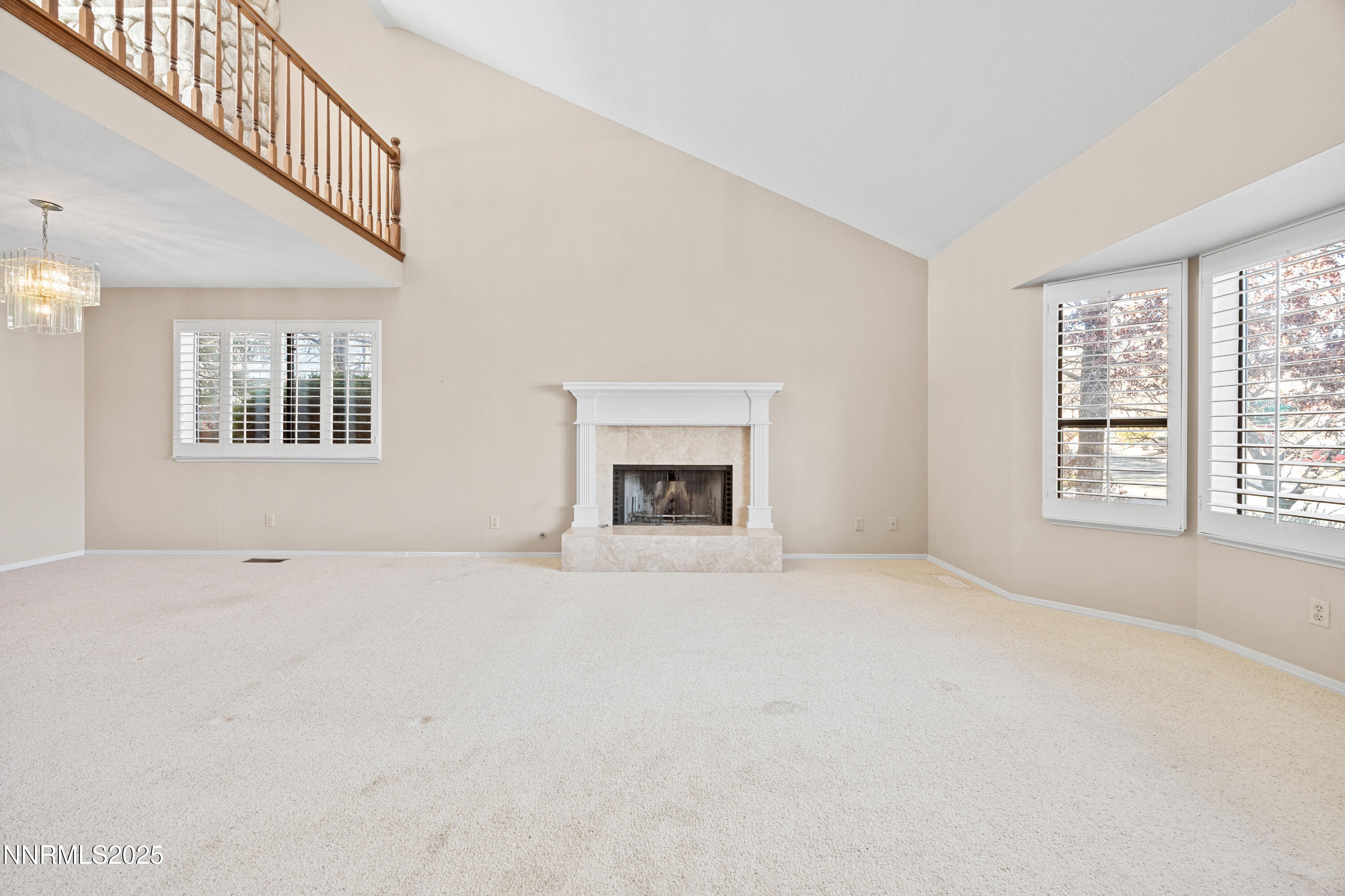 6299 Stone Valley Drive Reno, NV 89523 - Photo 6 of 70 a view of an empty room with a window